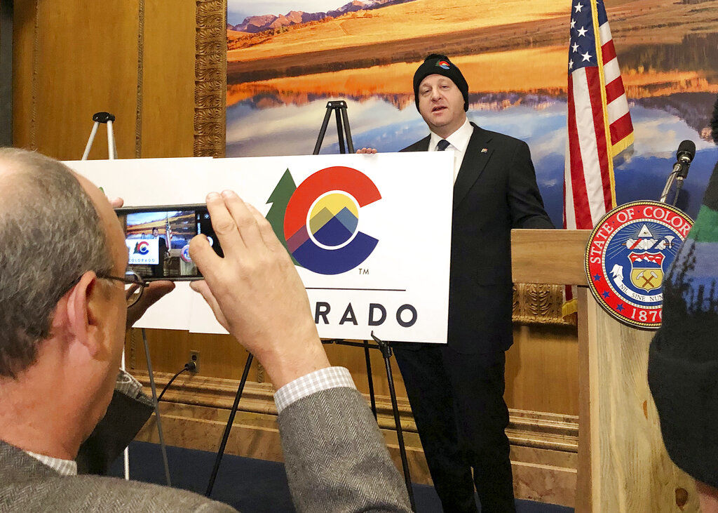 Symbolic gesture: Polis rolls out new Colorado logo.