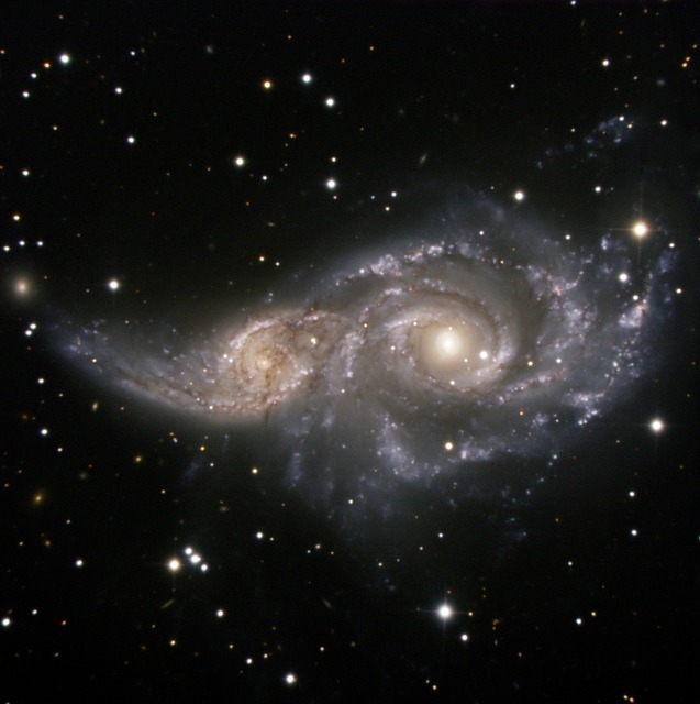 NGC 2207, SPIRAL GALAXY, LIGHT YEAR, GRAVITATION.