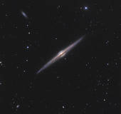 Stock Images of NGC 4565, an edge.