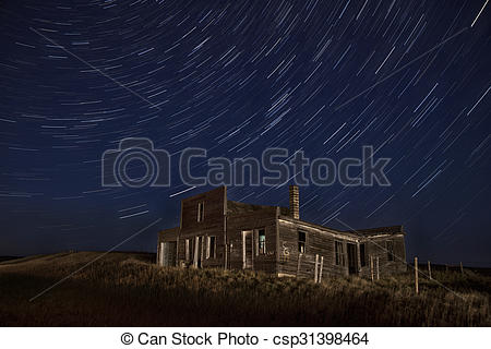 Stock Image of Star Trails Night Photography Abandoned Building.