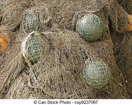 Picture of glass float, old fishing nets catch closeup csp9237067.
