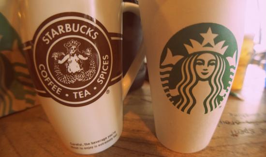 Old and new Starbucks logos.
