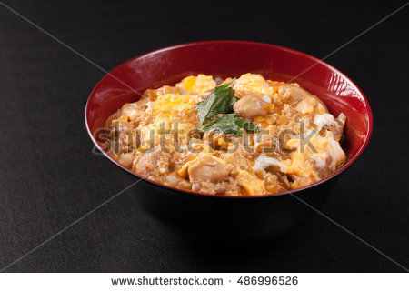 Bowl Of Rice Topped With Chicken And Eggs Stock Photos, Royalty.