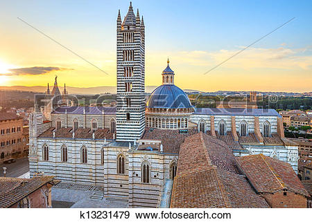 Stock Photograph of Siena aerial sunset panoramic view. Cathedral.