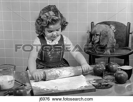 Stock Images of 1950S Little Girl Rolling Out Apple Pie Crust On.