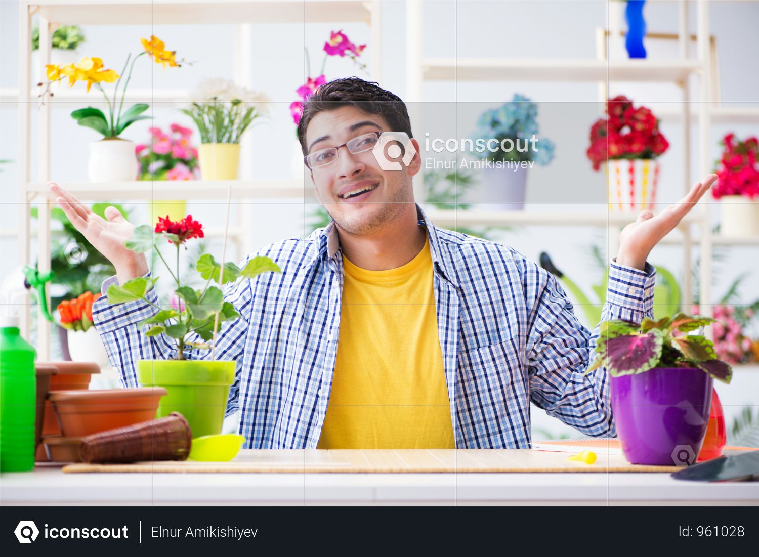 Premium Gardener Florist Working In A Flower Shop With House Plants Photo  download in PNG & JPG format.
