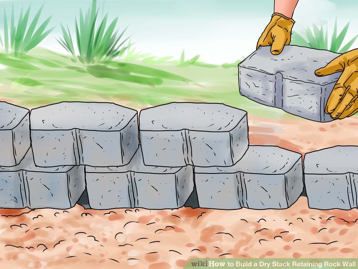How to Build a Dry Stack Retaining Rock Wall: 9 Steps.