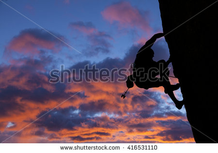 Silhouette Man Climbing On Rock Mountain Stock Photo 180605549.