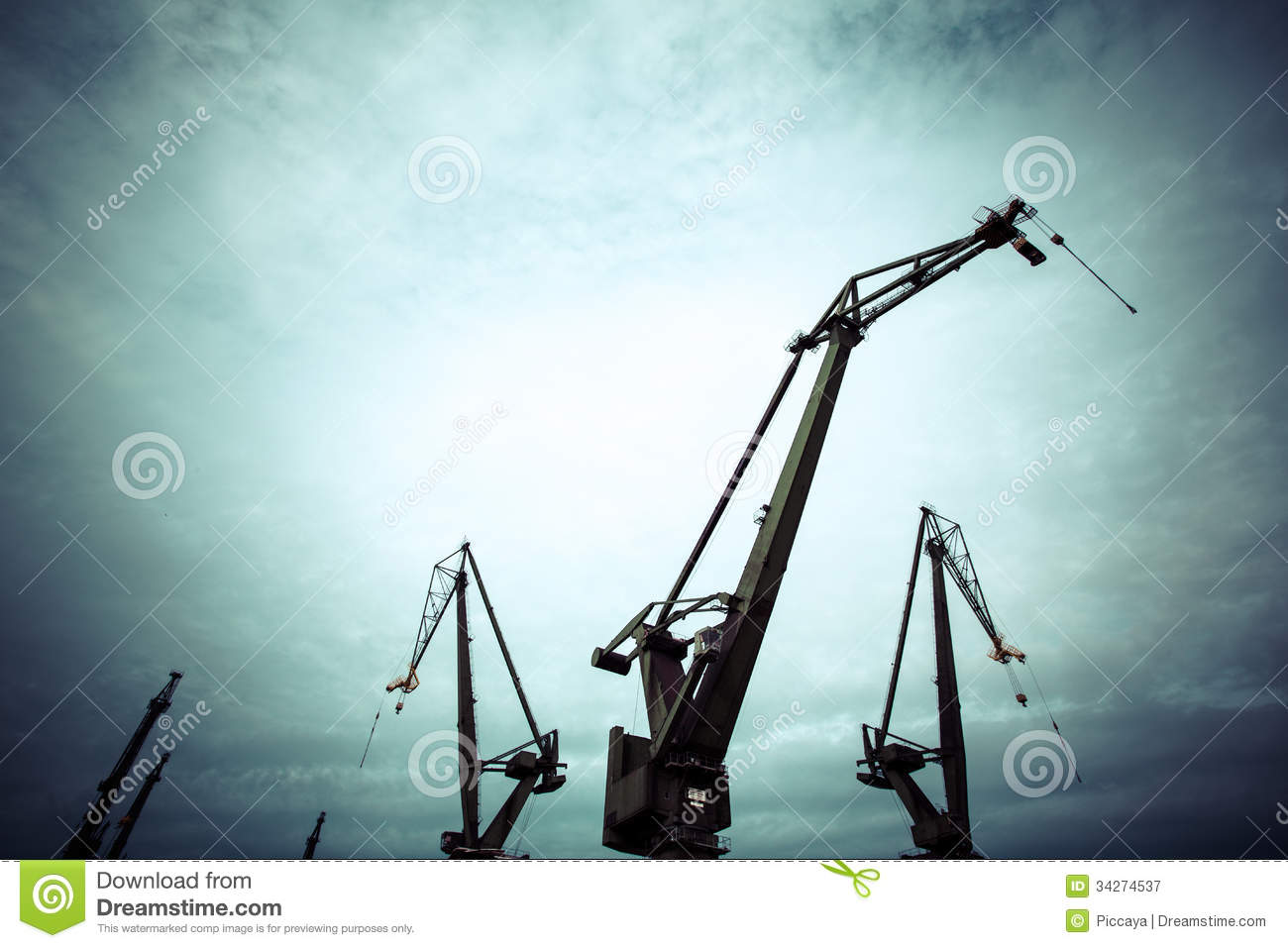 Silhouettes Of Industrial Cranes In Gdansk Shipyard Royalty Free.
