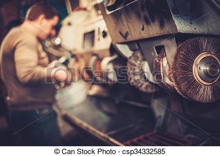 Pictures of Shoemaker repairs shoes in the studio craft grinder.