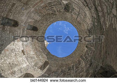 Stock Photo of Low angle view of skylight in stone dome bld144924.