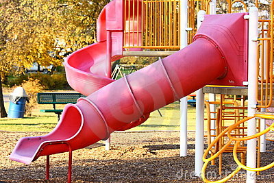 Playground Tunnel Slide Stock Photo.