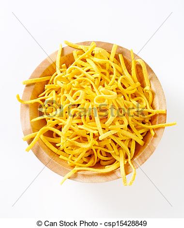 Stock Photo of Thin spaetzle in a wooden bowl csp15428849.