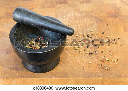 Stock Photography of Ground pepper in a stone bowl k18396480.