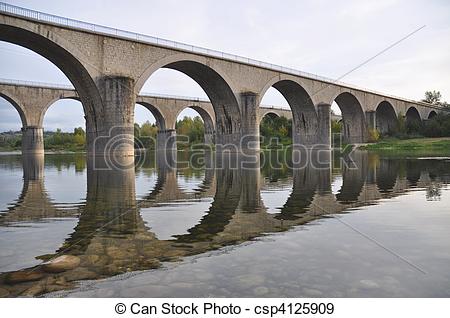 Stock Photographs of Stone bridges crossing river Ardeche.