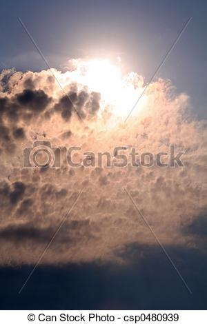 Stock Photographs of Sun Breaking Through Clouds in the Sky.