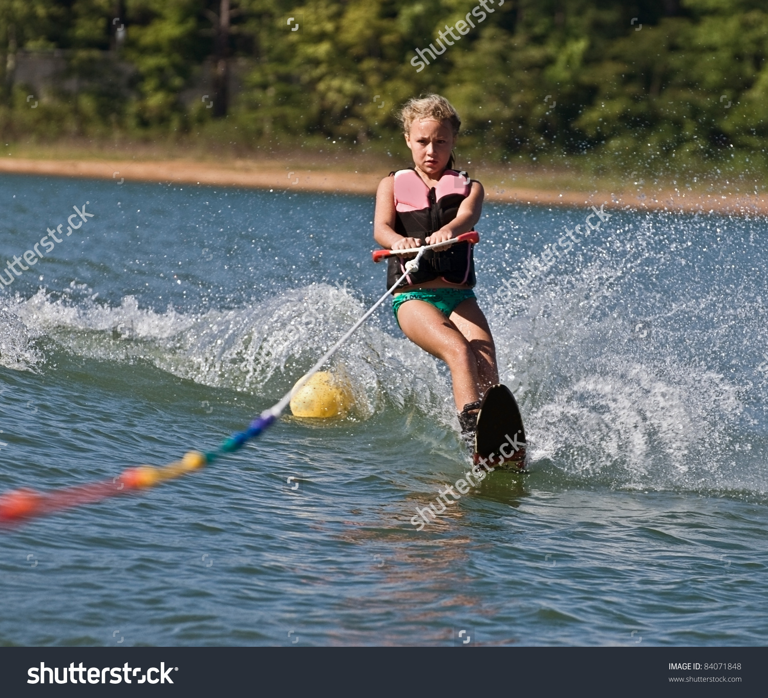 Young Girl Water Skiing On Slalom Stock Photo 84071848.