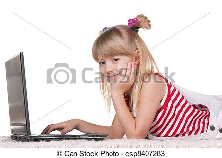 Stock Photos of Smiling girl studying with laptop lying on the.