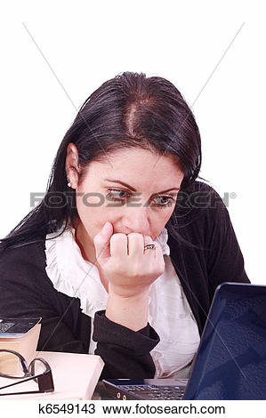 Stock Photo of Office worker with thoughtful look in front of.