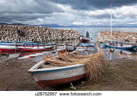 Picture of Lake Titicaca: Llachon peninsula, fishing boats moored.