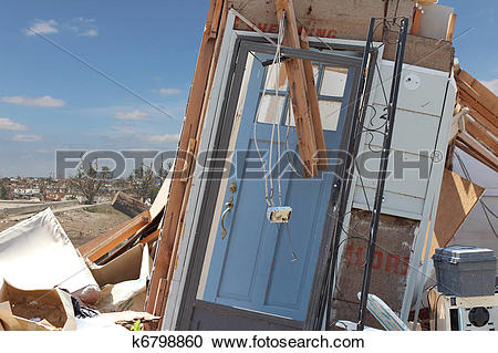Stock Photography of Tornado Damage Blue Front Door k6798860.