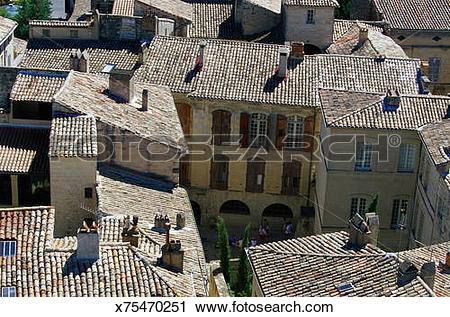 Stock Photography of Tile Roofed Buildings in Uzes, France.