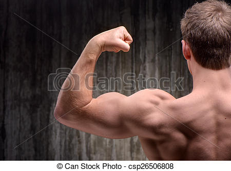 Stock Photography of Back view of well formed man demonstrating.