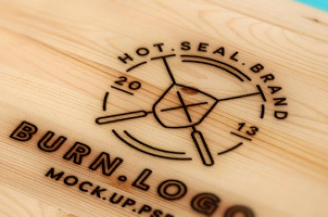 A fresh looking wood burning psd logo mockup with a.